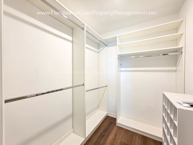 Building Photo - EXCEPTIONAL AND SPACIOUS FURNISHED TOWNHOME WITHIN WATERSIDE- NAUTIQUE!