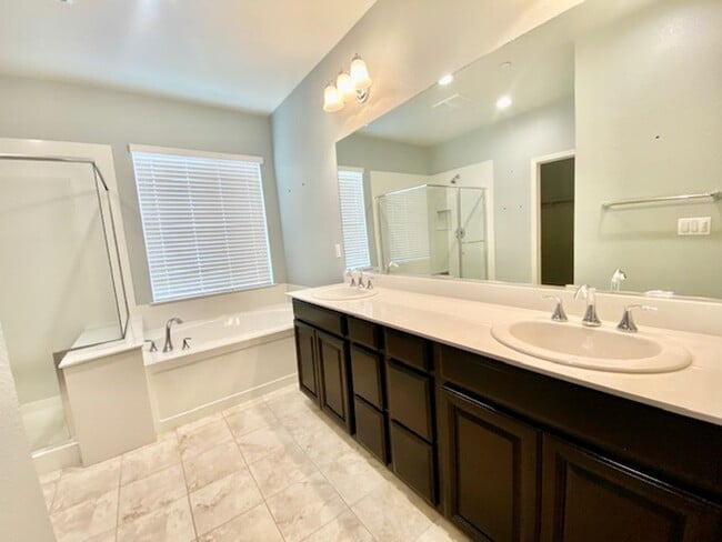 Building Photo - ALMOST NEW, UNIQUE 4 BEDROOM, 3 BATH, 2 CA...