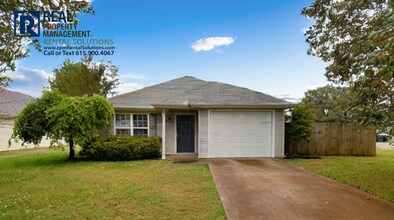 Building Photo - Adorable 2bd 2 ba home with fenced in yard and attached garage!