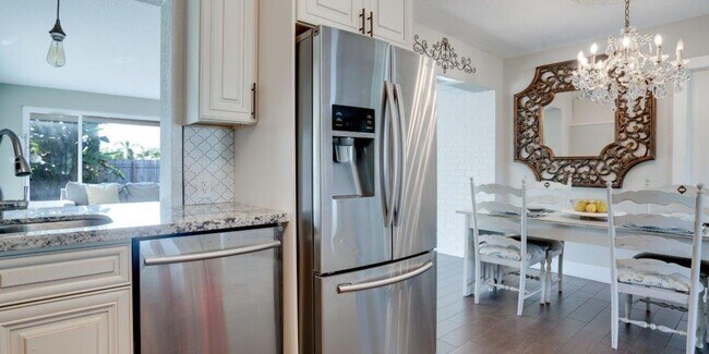 Building Photo - Step Into Sunshine: Modern Charm Meets Coa...
