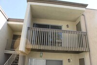 Building Photo - Charming 2BR/1BA Condo – Resort-Style Amenities!