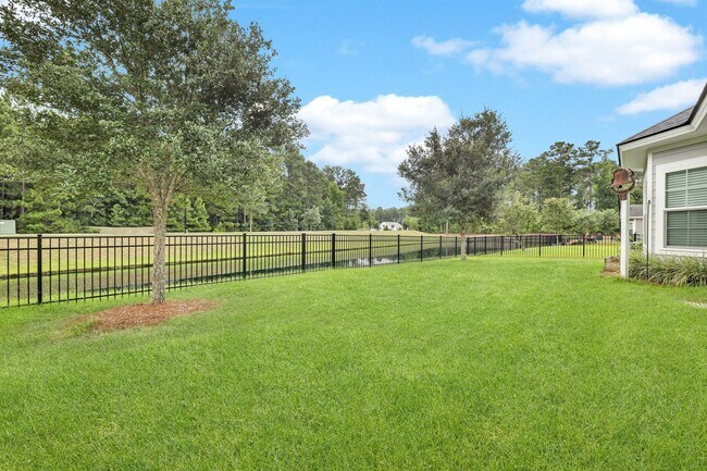 Building Photo - Spacious 4BR/3BA Pooler Home – Lagoon Views, Prime Location