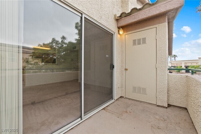 Building Photo - 5710 E Tropicana Ave