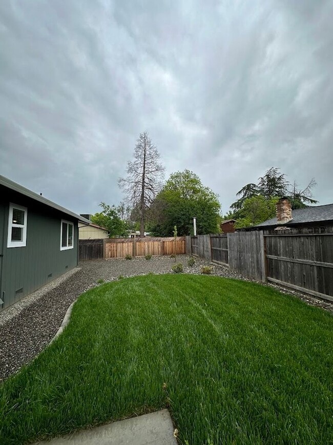 Building Photo - Updated Home with Island Kitchen, LVP Flooring, and Yard Care Included!