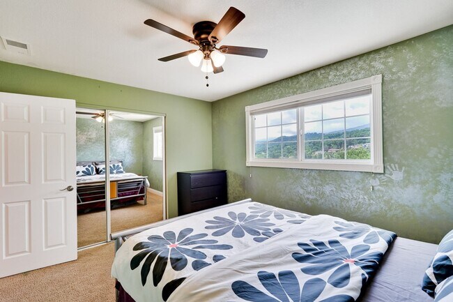 Building Photo - Remodeled 5 Bedroom Home with Heated Pool, Hillside Views, Solar, and Sunrise and Sunset Views in...