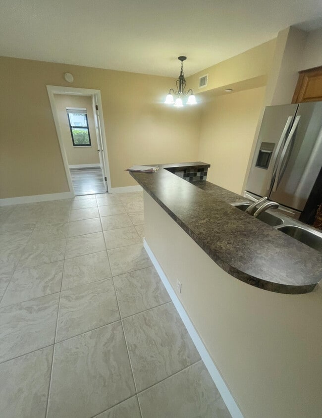 Building Photo - 7233 Golf Colony Ct