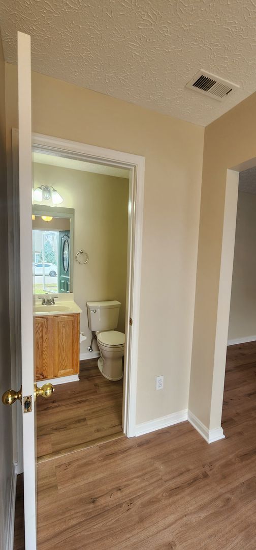 Building Photo - Fantastic 3 Bedrooms & 1.5 Bathroom, Two Story with a Garage!  Freshened Paint throughout!  Newer...