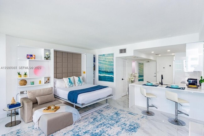 Building Photo - 10275 Collins Ave