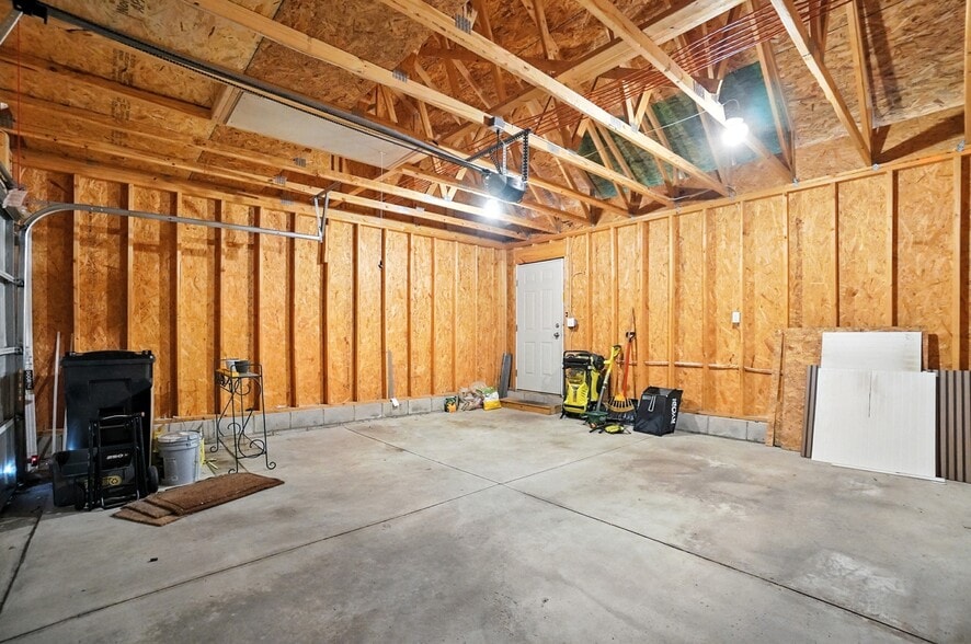 Two car garage with additional storage above - 6169 Needletail Rd