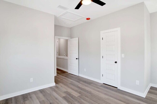 Building Photo - Downtown Pensacola Area 3BR/3BA | Each Bedroom Has Private Bath | Fenced Yard | Water & Lawn Care...