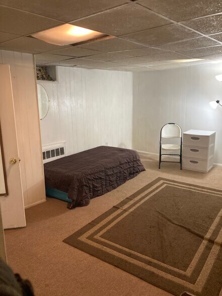 Twin bed closet, portable drawers - 764 Lenore Ln