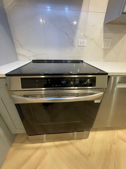 Induction cooktop, convention, and air fryer - 656 E 50th Pl