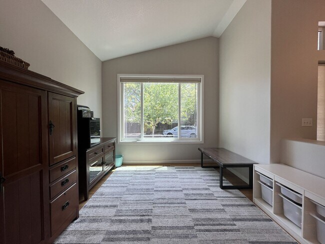 Building Photo - Spacious 3-Bedroom Home with Two Living Areas, Private Balcony, Fireplace & Attached 2-Car Garage