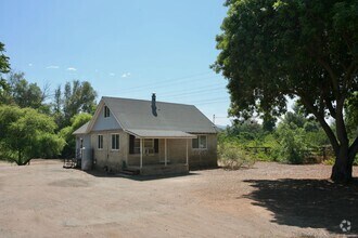 Building Photo - 3 Br that is a little bit country