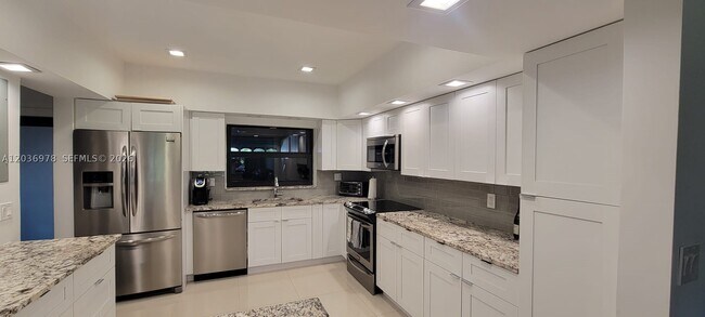 Building Photo - 9011 SW 62nd Terrace