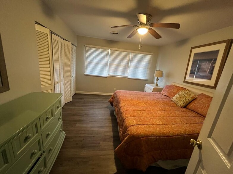 Bedroom With King Size Bed, Closet, And 2 Nightstands - 1204 Benna Dr