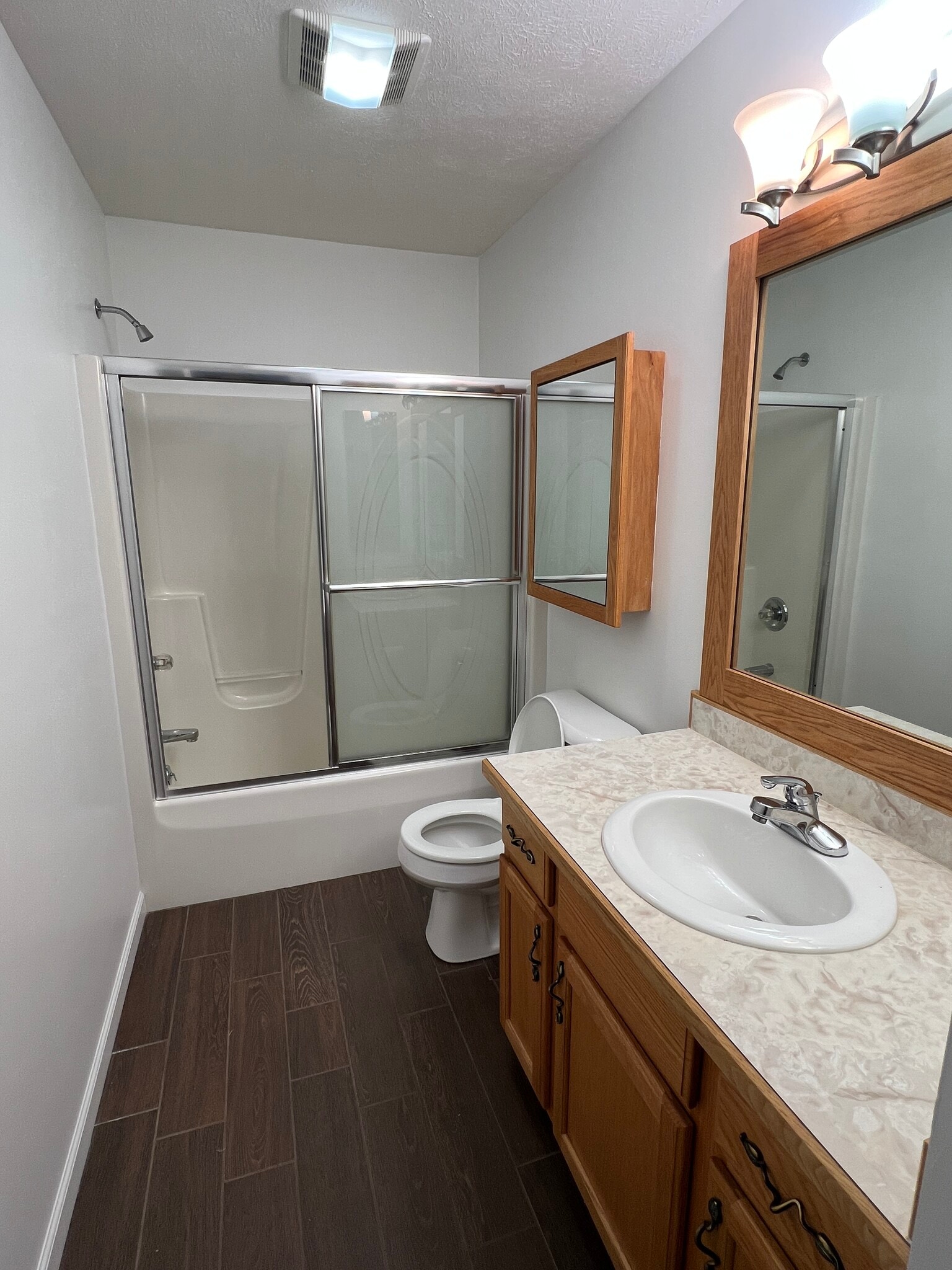 Full bathroom with tub - 214 W Sixteenth St