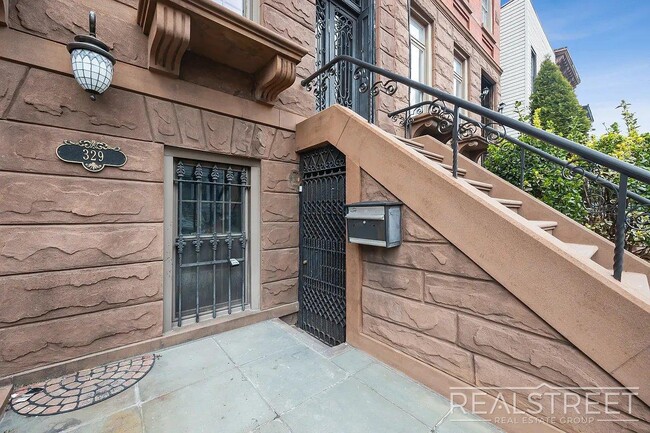 Building Photo - Timelessly Renovated Historic Triplex with...