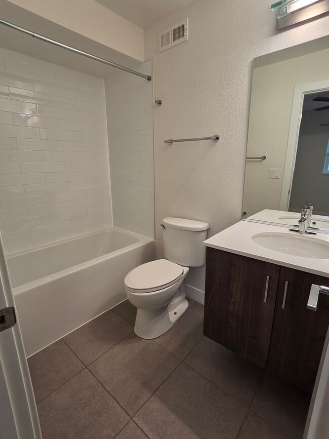 Building Photo - STUNNING 4-LEVEL TOWNHOME IN HIGHLANDS WITH SAUNA, 2-CAR GARAGE + AMAZING ROOFTOP DECK!