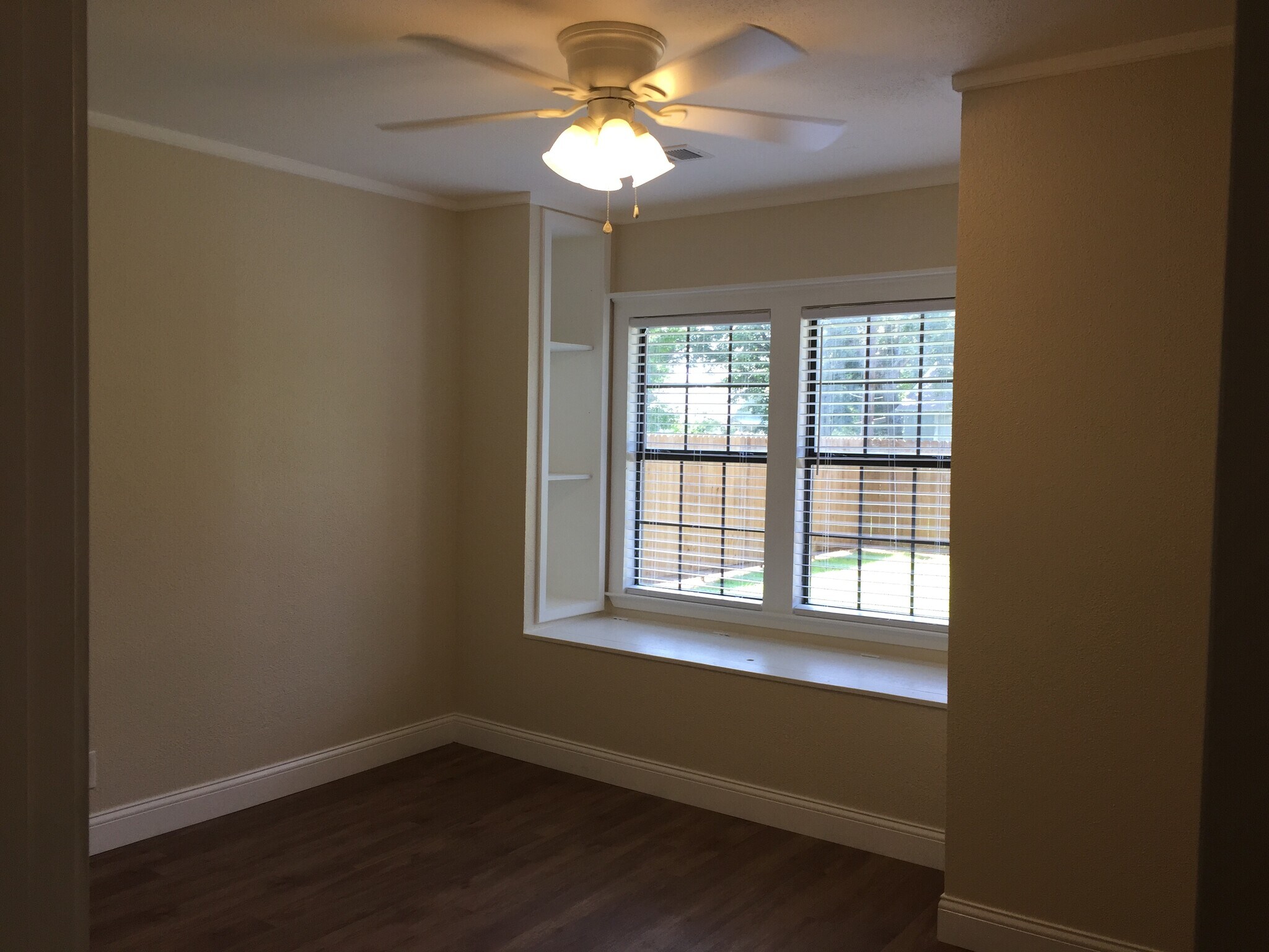 Window seat with storage underneath (in both back bedrooms) - 310 East 3rd St.