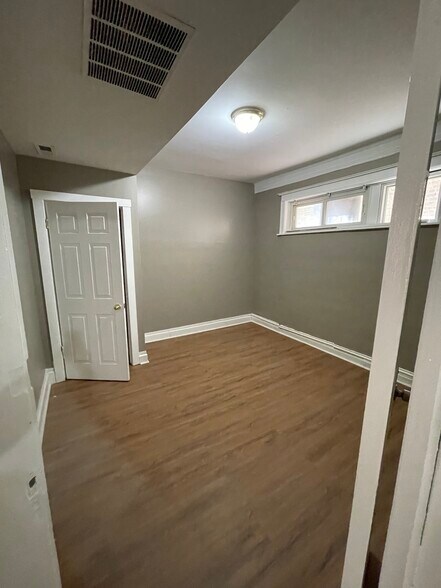 Building Photo - 6117 S Vernon Ave