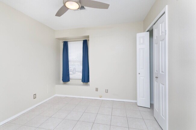 Building Photo - Bright, shiny, and updated compact home ne...