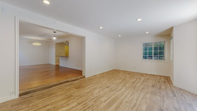 Family room, living room, dining area... - 18406 Bessemer St