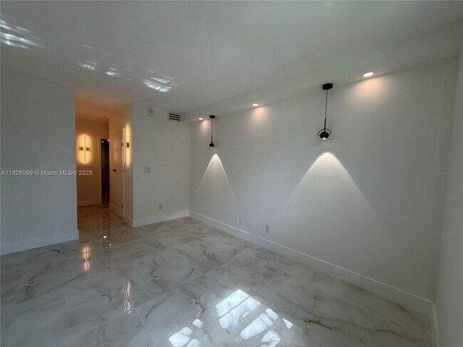 Building Photo - 19390 Collins Ave