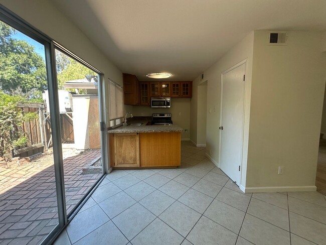 Building Photo - Updated 3 Bedroom 2 Bathroom Townhome with...