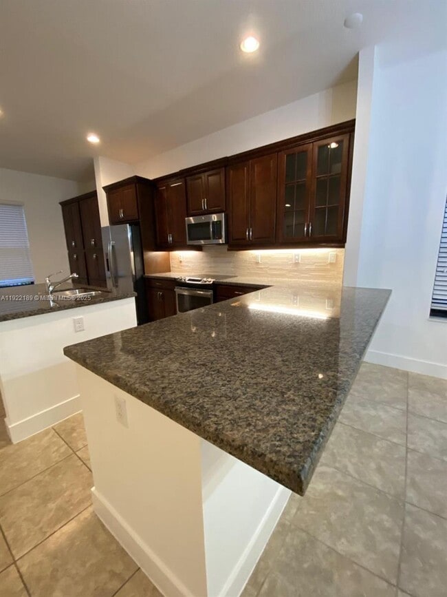 Building Photo - 9823 W 34th Ln