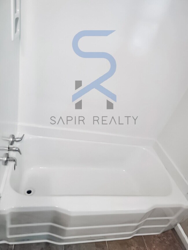 Building Photo - Move in before December 15th and choose your reward: a $250 Amazon Gift Card or a 55" Smart TV!