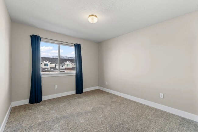 Building Photo - Upgraded 4-Bed Townhome with Finished Base...