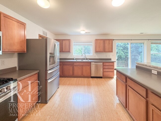 Building Photo - Spacious 4-Bedroom Home with Brand-New Carpet, Two Living Areas & Loft
