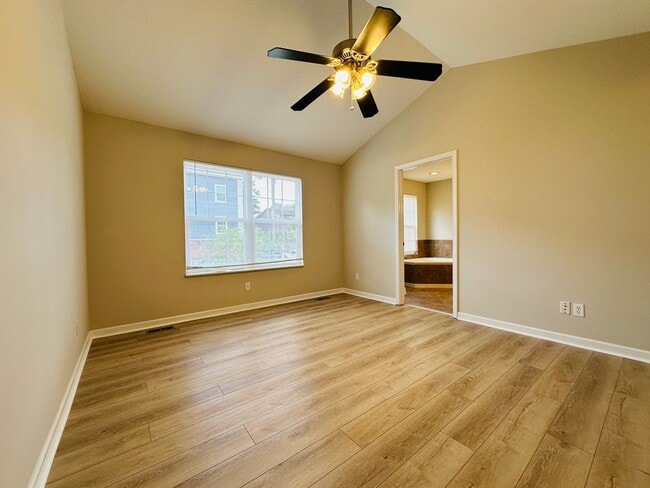 Building Photo - 2 bed, 2.5 bath updated townhouse w/ 1-car garage & Trex deck available now
