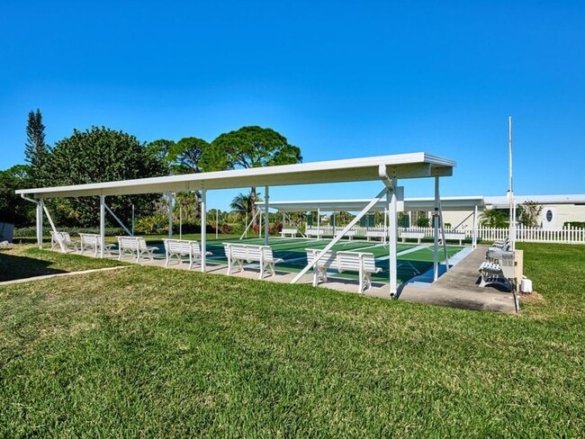 Building Photo - Large 2 Bedroom/2 Bath PALM HARBOR Manufactured Home in Cambridge 55+ Community In Hobe Sound Flo...