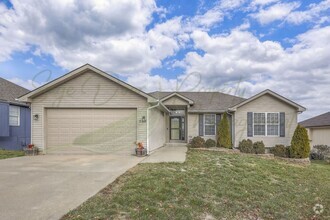 Building Photo - STUNNING GRAIN VALLEY HOME!!!