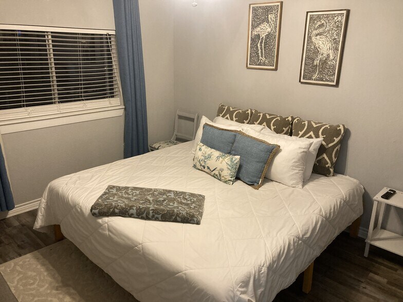 Pool Side Bedroom - 12500 Melville Dr