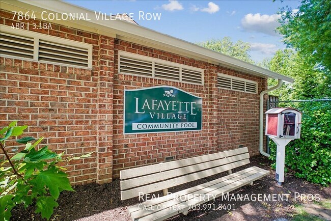 Building Photo - 7864 Colonial Village Row