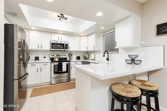 Building Photo - 12222 N Paradise Village Pkwy W