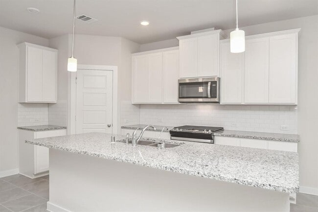 Building Photo - 8411 Rising Stream Dr