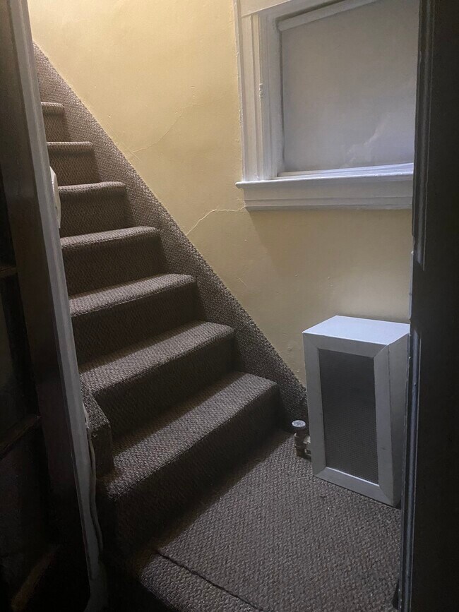Stairs to 2nd floor Apartment | closet on first floor - 9036 205th St