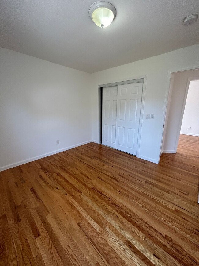 Building Photo - Discover Your Dream Home in Neptune: Spacious 4-Bedroom, 2.5-Bath with Private Backyard and Drive...