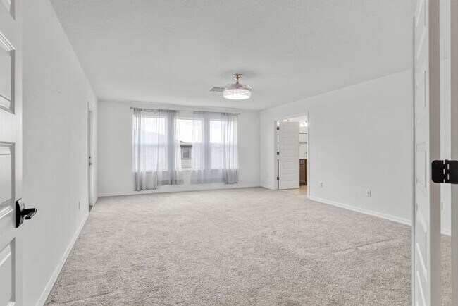 Building Photo - Discover luxury living in the gated Whispe...