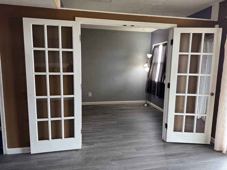 Downstairs Bedroom/Den/Office w/ French Doors - 7504 Liberty Bell Dr