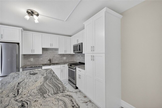 Building Photo - 12350 Woodrose Ct