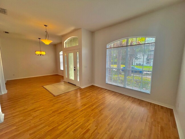Building Photo - Spacious 4-Bed, 3-Bath Home in Guard-Gated...