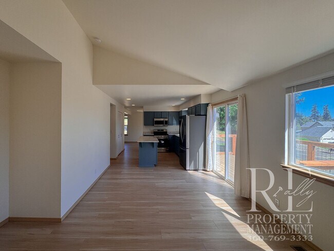 Building Photo - Immaculate Bremerton Home with Expansive Yard, Multiple Living Areas & Designer Kitchen