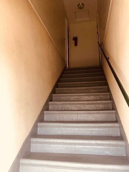 Top of stairs - 112 S Chevy Chase Dr