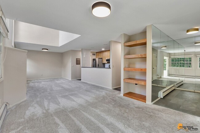 Building Photo - Spacious and bright condo located in a quiet area that boasts the perfect combination of style an...