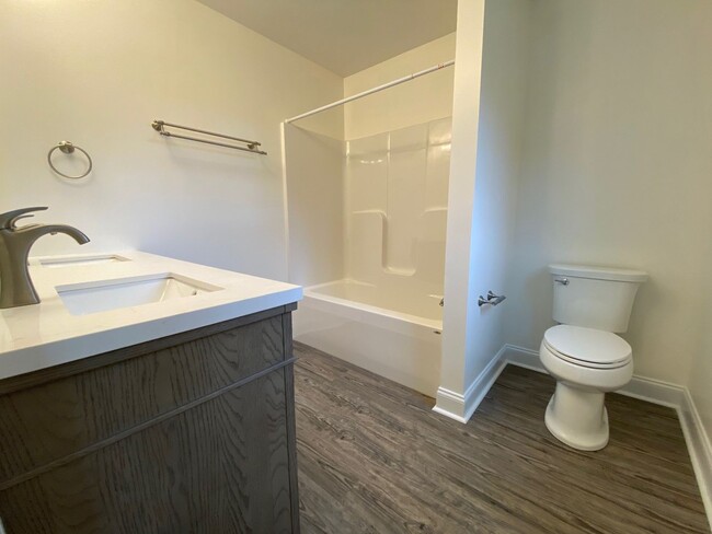 Building Photo - Pristine Duplex with Hardwood Floors and M...